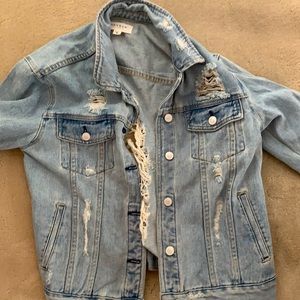 Distressed denim jacket